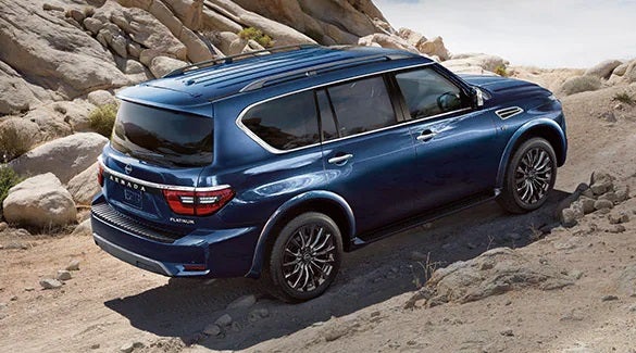 2023 Nissan Armada ascending off road hill illustrating body-on-frame construction. | Destination Nissan in Albany NY